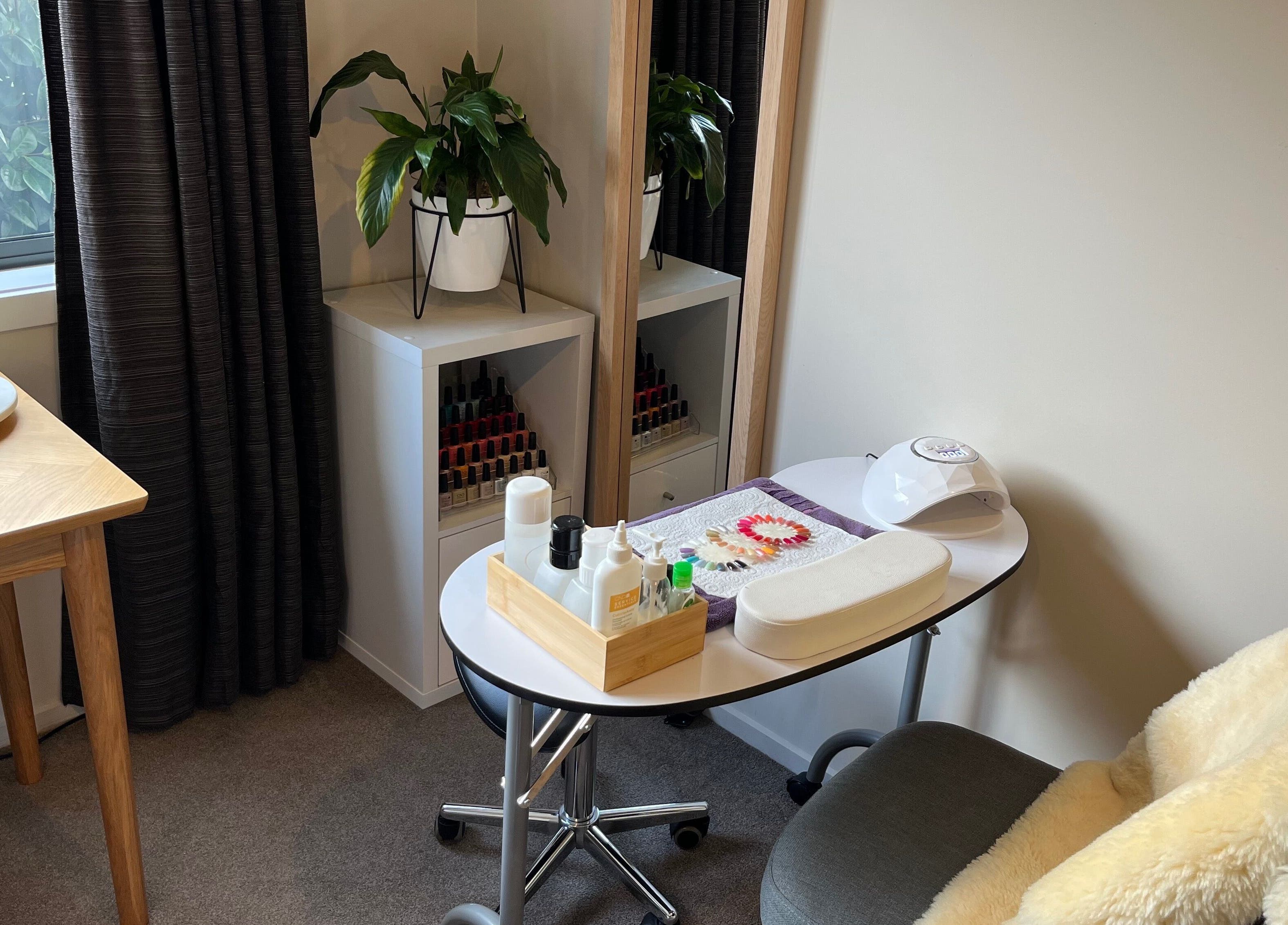 Nail care station at Selene Beauty in Christchurch, Canterbury Region, NZ, with cozy decor and manicure essentials.