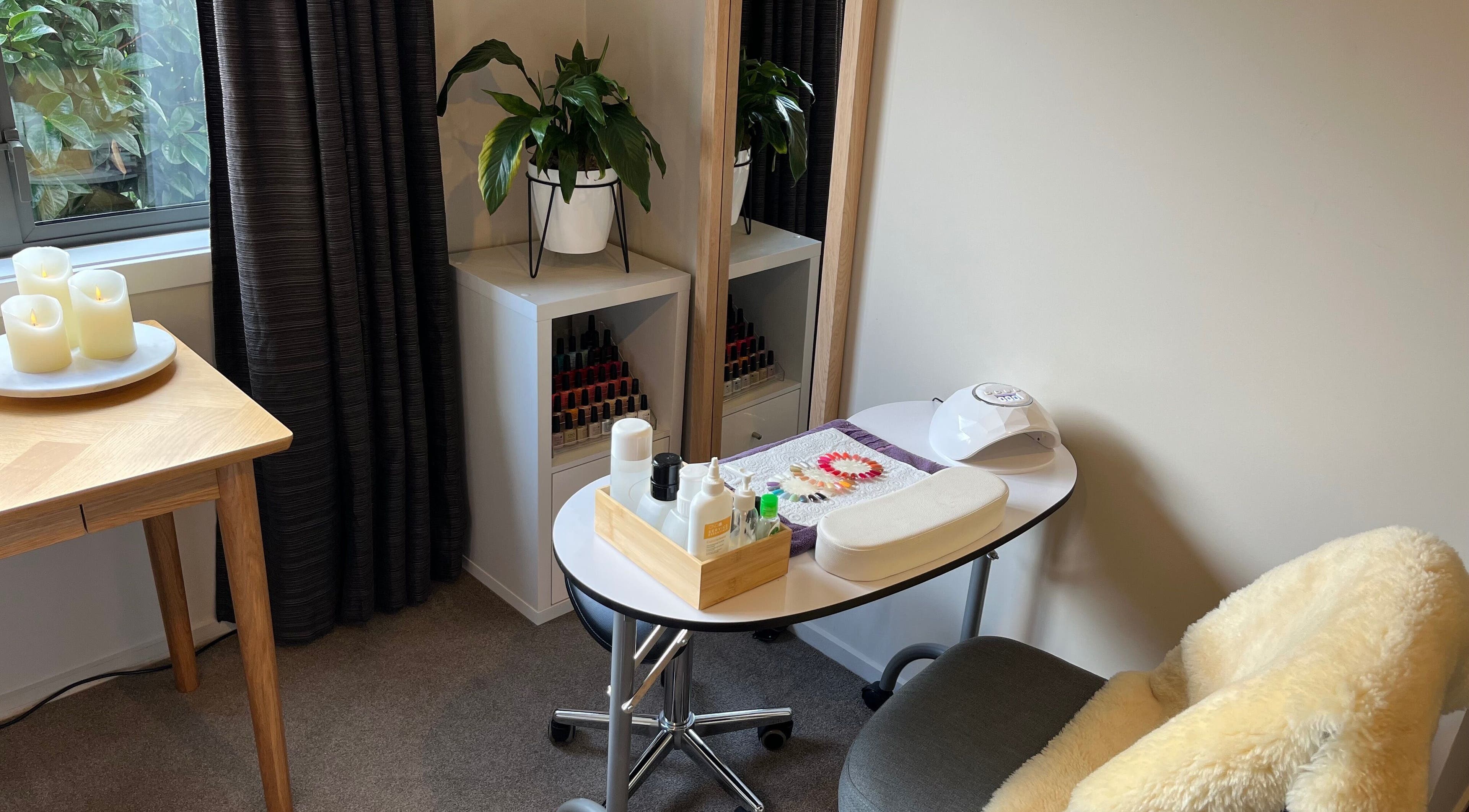 Nail care station at Selene Beauty in Christchurch, Canterbury Region, NZ, with cozy decor and manicure essentials.