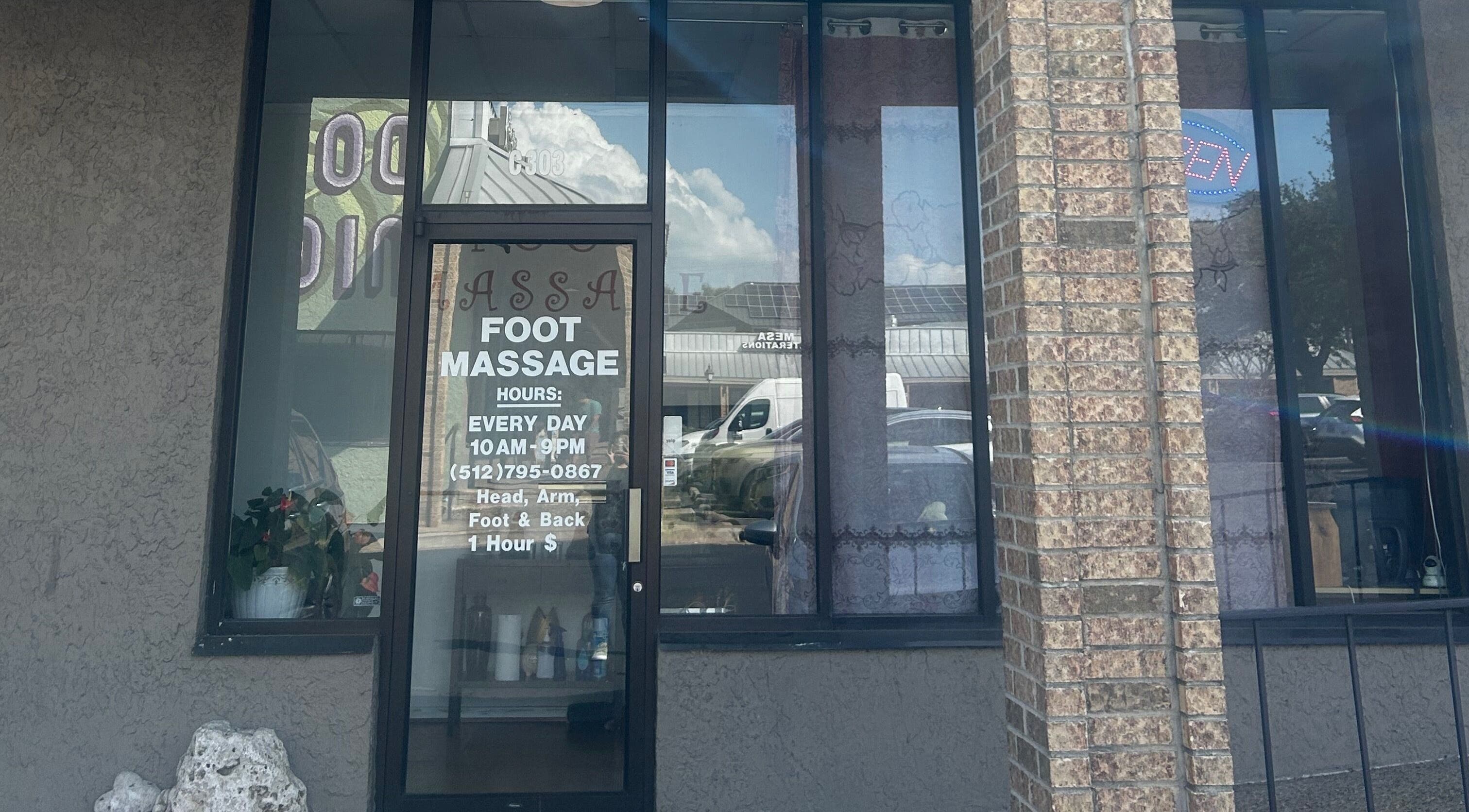 Entrance of Asain Foot Massage in Austin, Texas, US, featuring glass doors and welcoming ambiance.