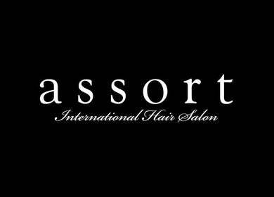 Assort Los Angeles (Popup) logo in elegant script, representing a premier salon in Los Angeles, California, US.