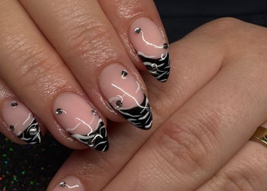 Black and white zebra nail art at SCULPTED BY LIZA, Bowling Green, Ohio, US.