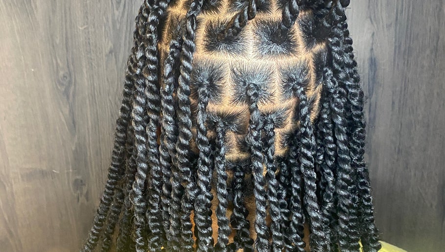 Intricate twisted braids at Done_byty in Katy, Texas, US, showcasing detailed hairstyling artistry.