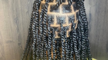 Intricate twisted braids at Done_byty in Katy, Texas, US, showcasing detailed hairstyling artistry.