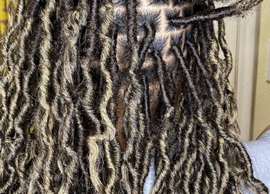 Intricate hair twists styled at Done_byty in Katy, Texas, US, showcasing detailed craftsmanship.