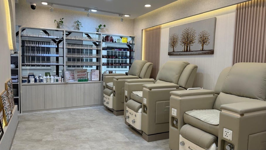 Luxurious seating area at HighBrow | The Adelphi, Singapore, Singapore, SG with reclining chairs and shelves.