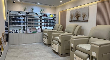 Luxurious seating area at HighBrow | The Adelphi, Singapore, Singapore, SG with reclining chairs and shelves.