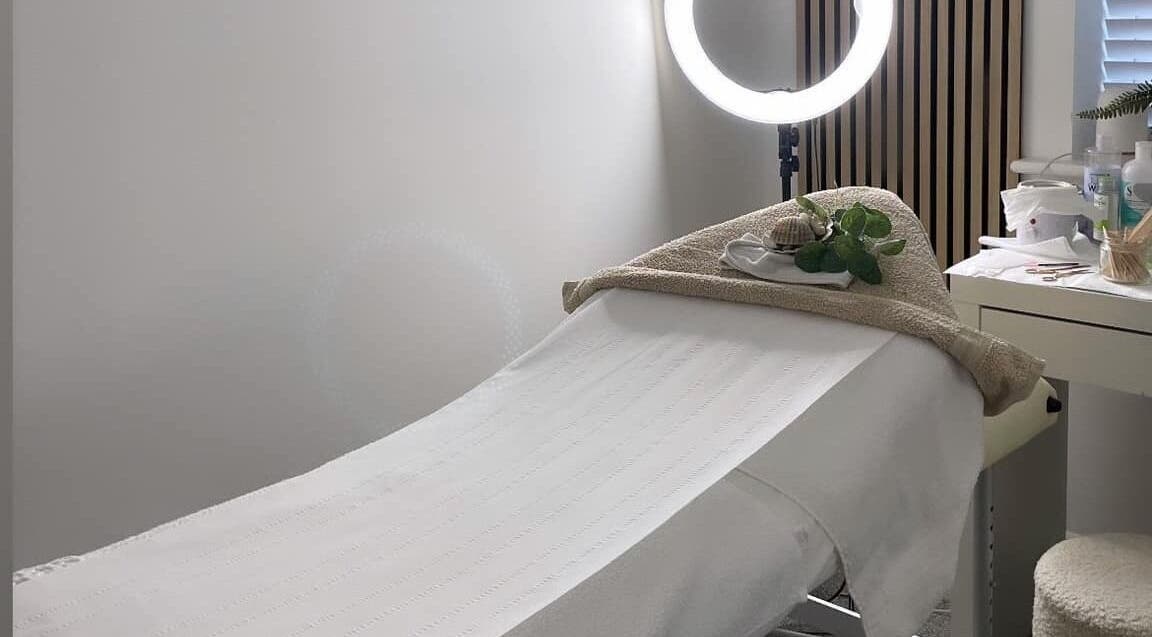 Relaxing treatment bed setup at Lilly's Lashes in Bellbowrie, Queensland, AU with ambient lighting.