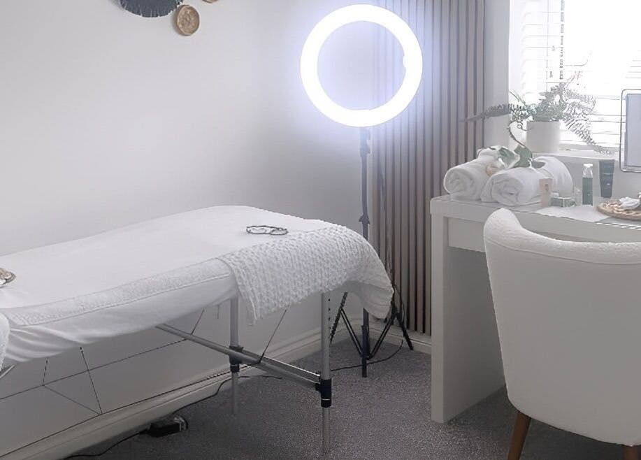 Relaxing treatment space at Lilly’s Lashes, Bellbowrie, Queensland, AU with massage table and calming decor.