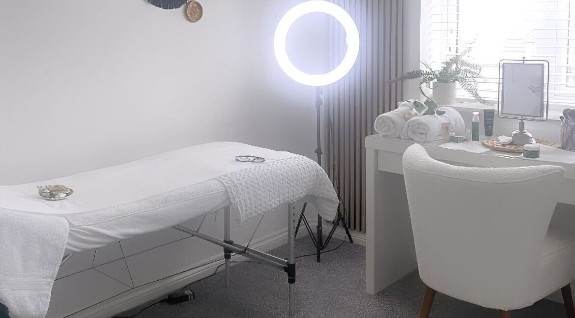 Relaxing treatment space at Lilly’s Lashes, Bellbowrie, Queensland, AU with massage table and calming decor.