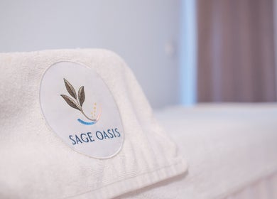 Close-up of a branded towel at Sage Oasis Beauty Studio in Singapore, SG, symbolizing luxury and relaxation.