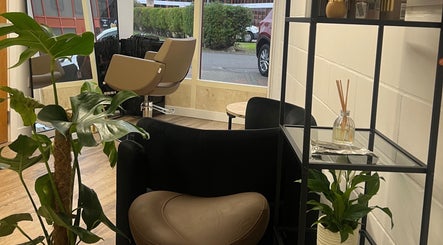 Modern salon seating with plants at The Alex’s Lounge, Peterborough, England, GB.