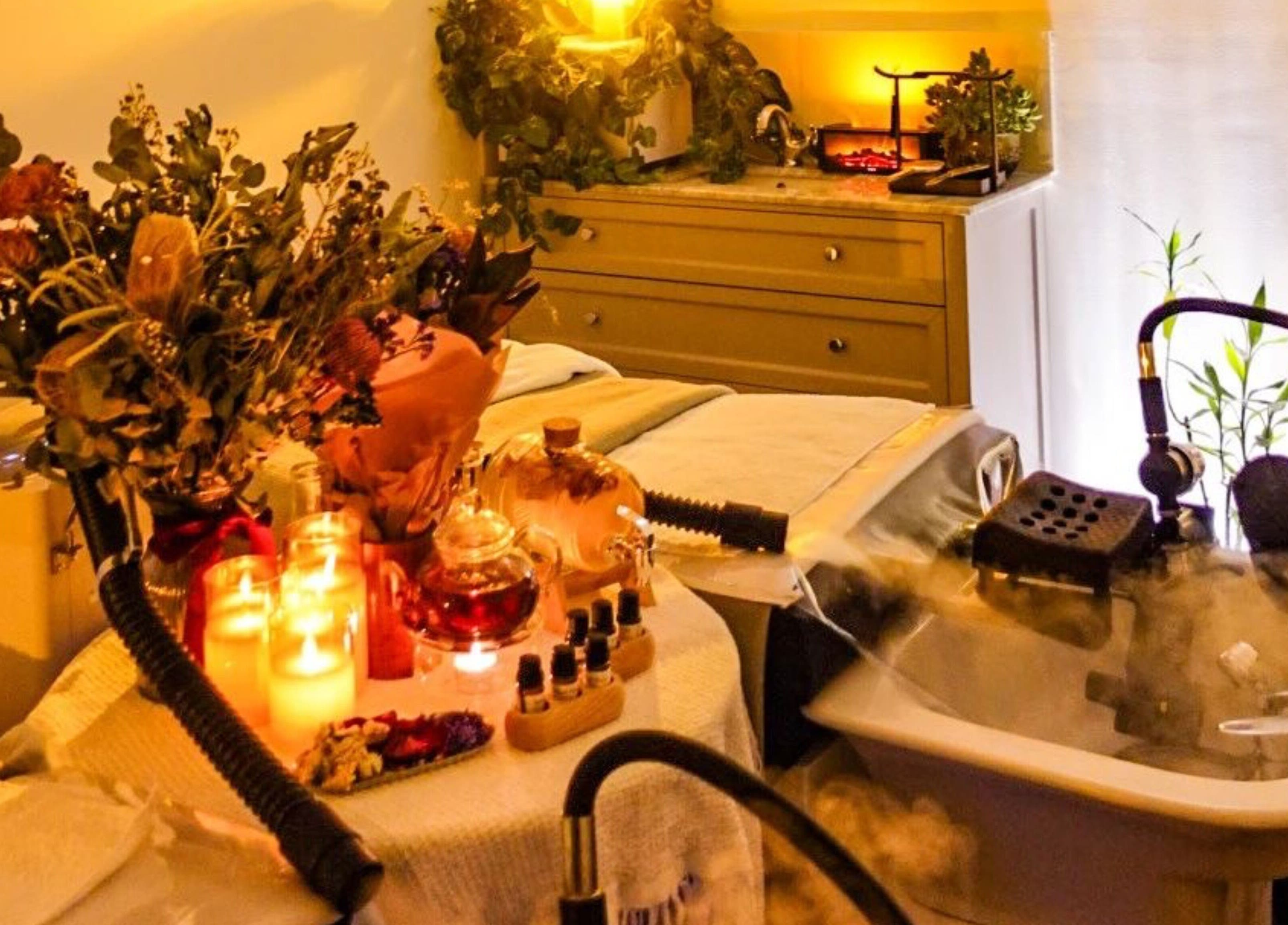 Relaxing spa setup with candles and flowers at M.Y. True Beauty, Burwood, New South Wales, AU.