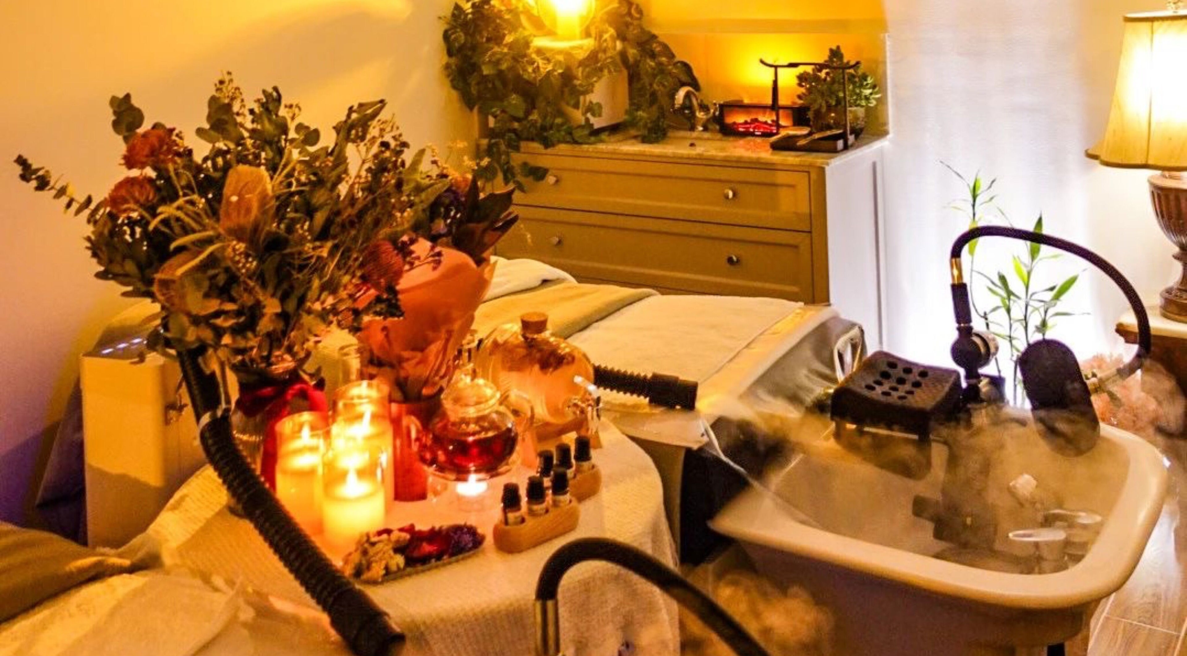 Tranquil spa room at M.Y. True Beauty in Burwood, New South Wales, AU with candles and aromatherapy setup.
