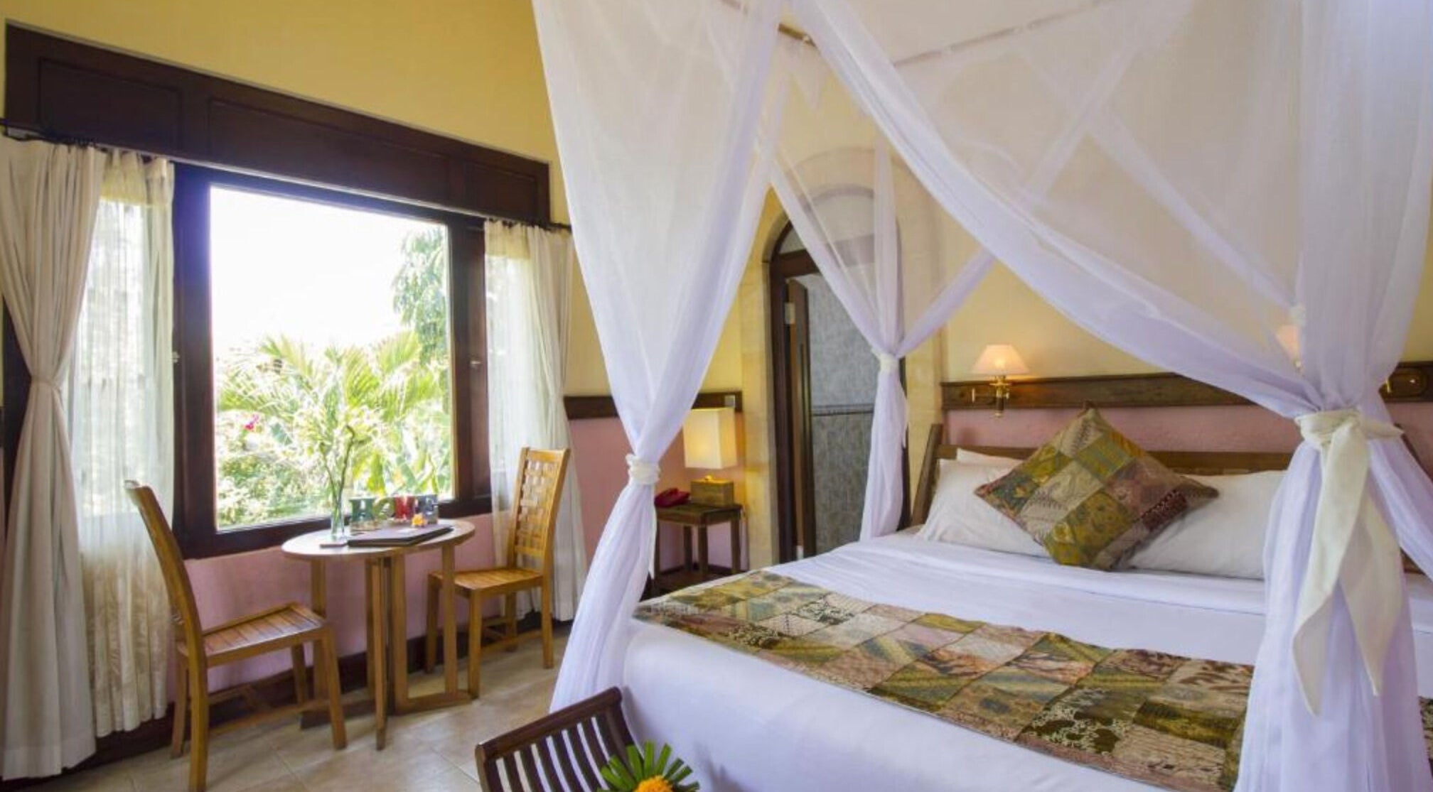 Elegant room with canopy bed at Ubud Aura Wellness Sanctuary, Bali, Bali, ID, offering serene views.