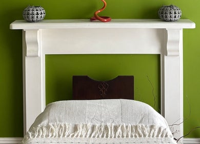 Cozy treatment room at Better Health Kinesiology, Cardiff, Wales, GB, featuring elegant decor with earthy tones.