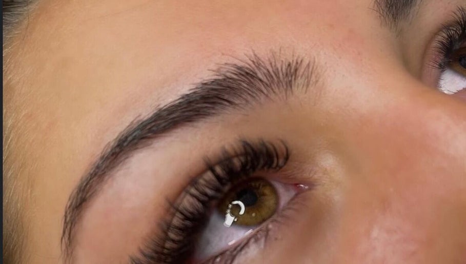 Close-up of lush lashes and eyebrows at prettify by MJ, Sidcup, England, GB enhancing natural beauty.
