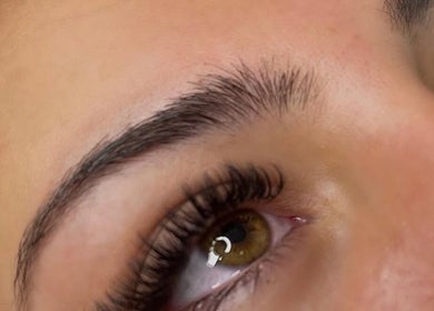Close-up of lush lashes and eyebrows at prettify by MJ, Sidcup, England, GB enhancing natural beauty.