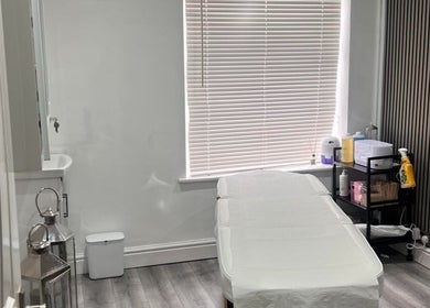 Relaxing treatment room at The Wax Fairy Bolton, elegant and serene, located in Bolton, England, GB.