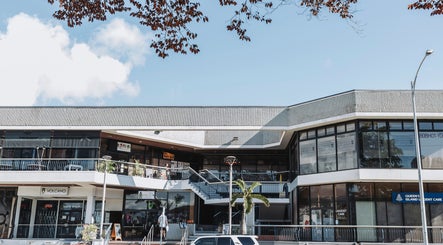 Front view of BROW DIRECTION at a modern mall in Honolulu, Hawaii, US.