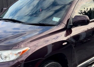 Shiny, detailed car at Buff Bros Auto Detailing, Auckland, Auckland, NZ, showcasing expert detailing work.