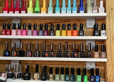 Colorful nail polish display at Monate Nails, Soweto, Gauteng, ZA, showcasing a variety of gel options.