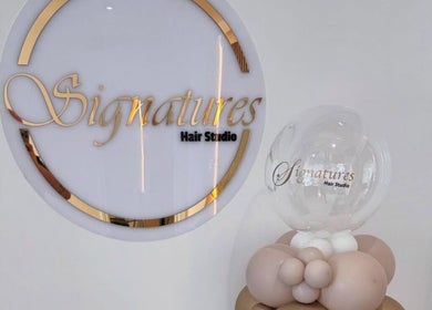 Elegant Signatures Hair Studio logo with balloon decor at TJJ_Hair, Crawley, England, GB.