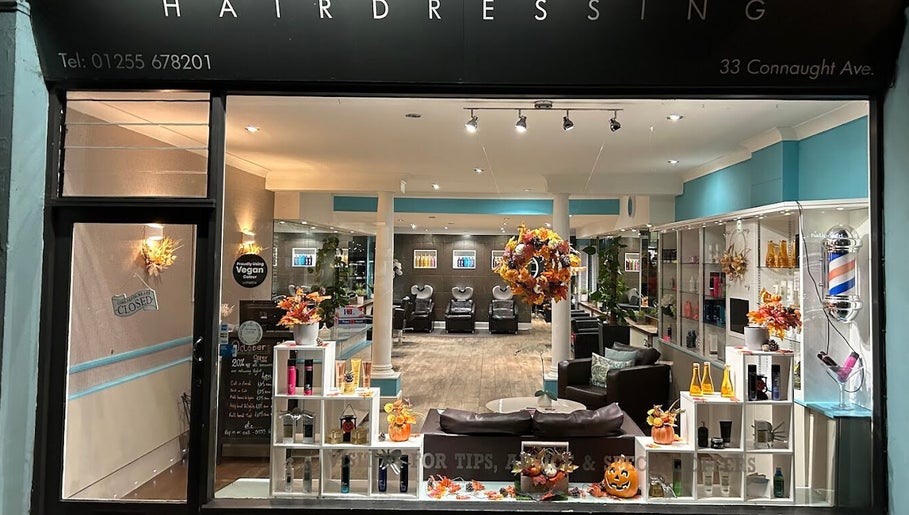 Front view of Silked by MJ salon in Frinton-on-sea, England, GB, showcasing modern interior and vibrant display.