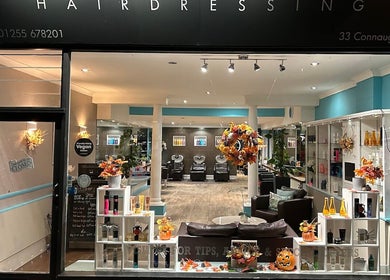 Front view of Silked by MJ salon in Frinton-on-sea, England, GB, showcasing modern interior and vibrant display.