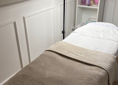 Comfortable treatment bed at Bay Skin Clinic in North Shields, England, GB offering relaxing wellness services.
