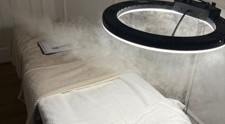 Treatment bed with steam at Bay Skin Clinic, North Shields, England, GB, providing a calming ambiance.