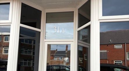 Entrance of Bay Skin Clinic at 31A, North Shields, England, GB, showing opening hours.