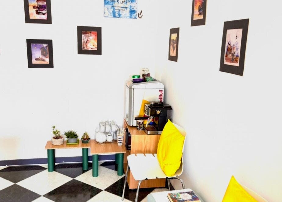 Inviting nook at Hands of Healing in Cape Town, Western Cape, ZA featuring vibrant decor and seating.