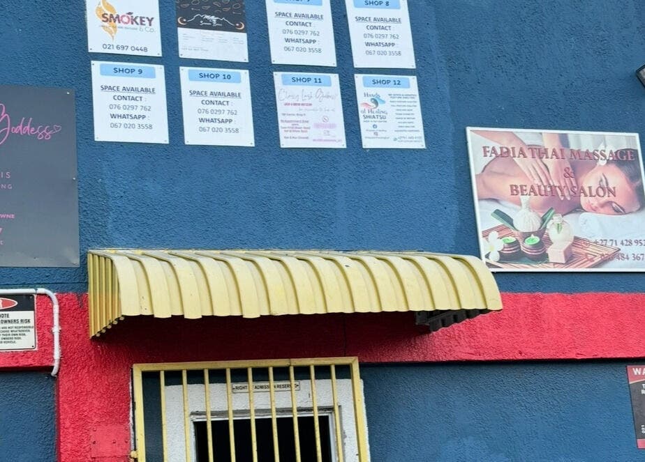 Entrance to Hands of Healing, a beauty venue in Cape Town, Western Cape, ZA with prominent signage.