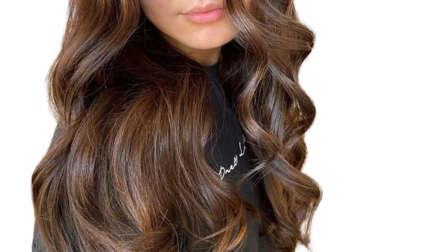 Beautiful brunette curls styled at Hair By Immy in Birmingham, England, GB, showcasing luxurious hair texture.