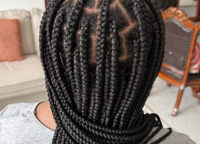 Close-up of intricate braids by Braidsby Zara in Pickerington, Ohio, US. Showcasing expert styling.