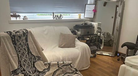 Cozy therapy room at Reflexology by Joanna in Coventry, England, GB with modern decor and comfortable seating.