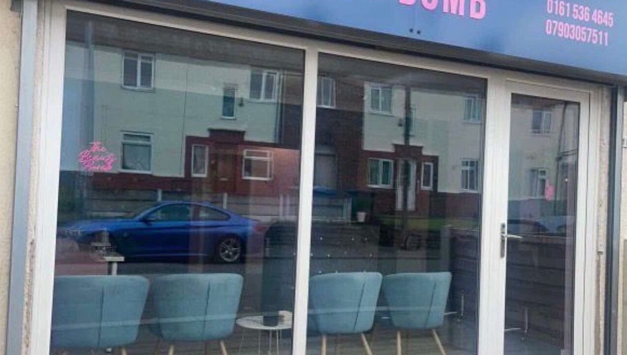 DMD Aesthetics venue entrance with modern glass windows in Eccles, England, GB.