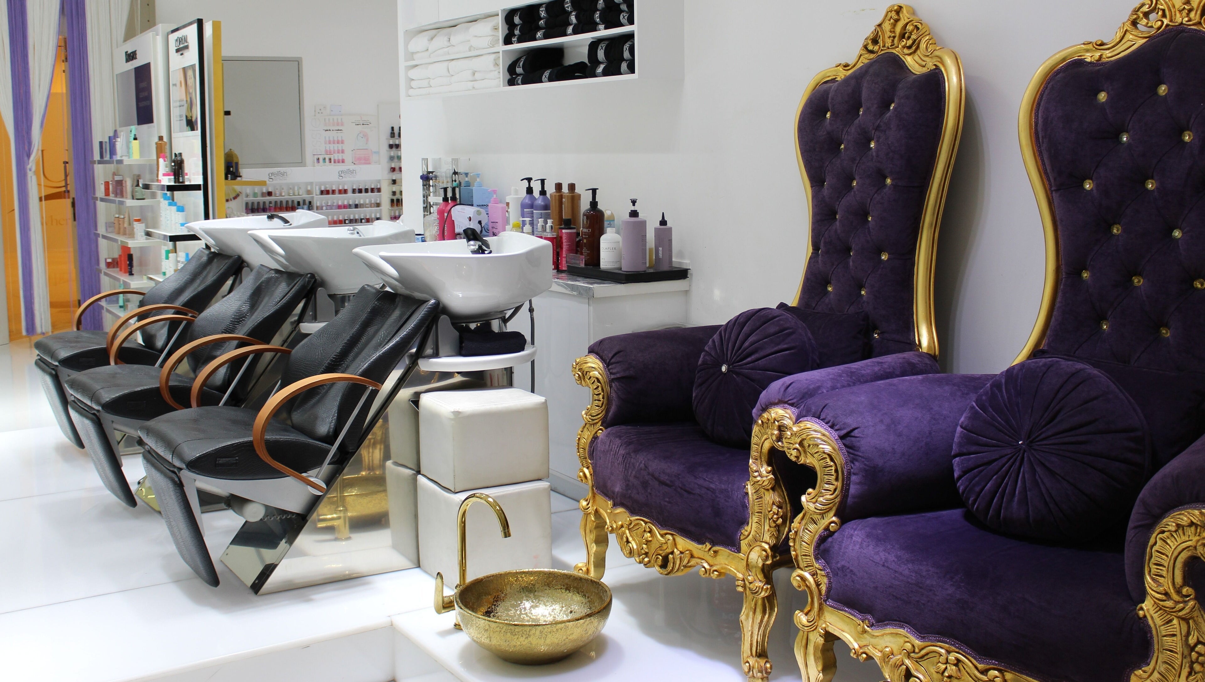 Elegant seating at Hush Salon Prive - Ladies Only & Moroccan Bath, Dubai, Dubai, AE with plush purple chairs.