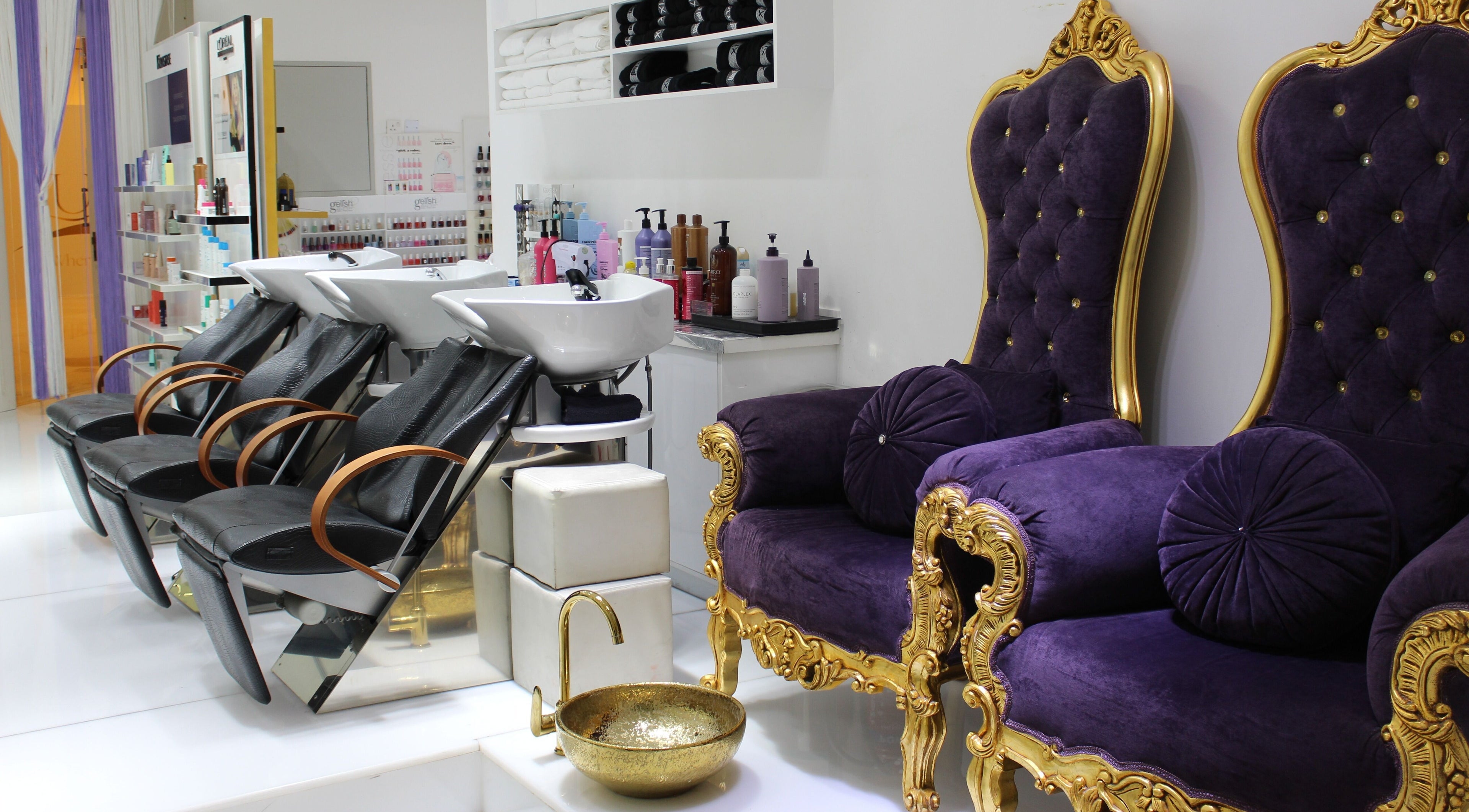 Elegant seating at Hush Salon Prive - Ladies Only & Moroccan Bath, Dubai, Dubai, AE with plush purple chairs.