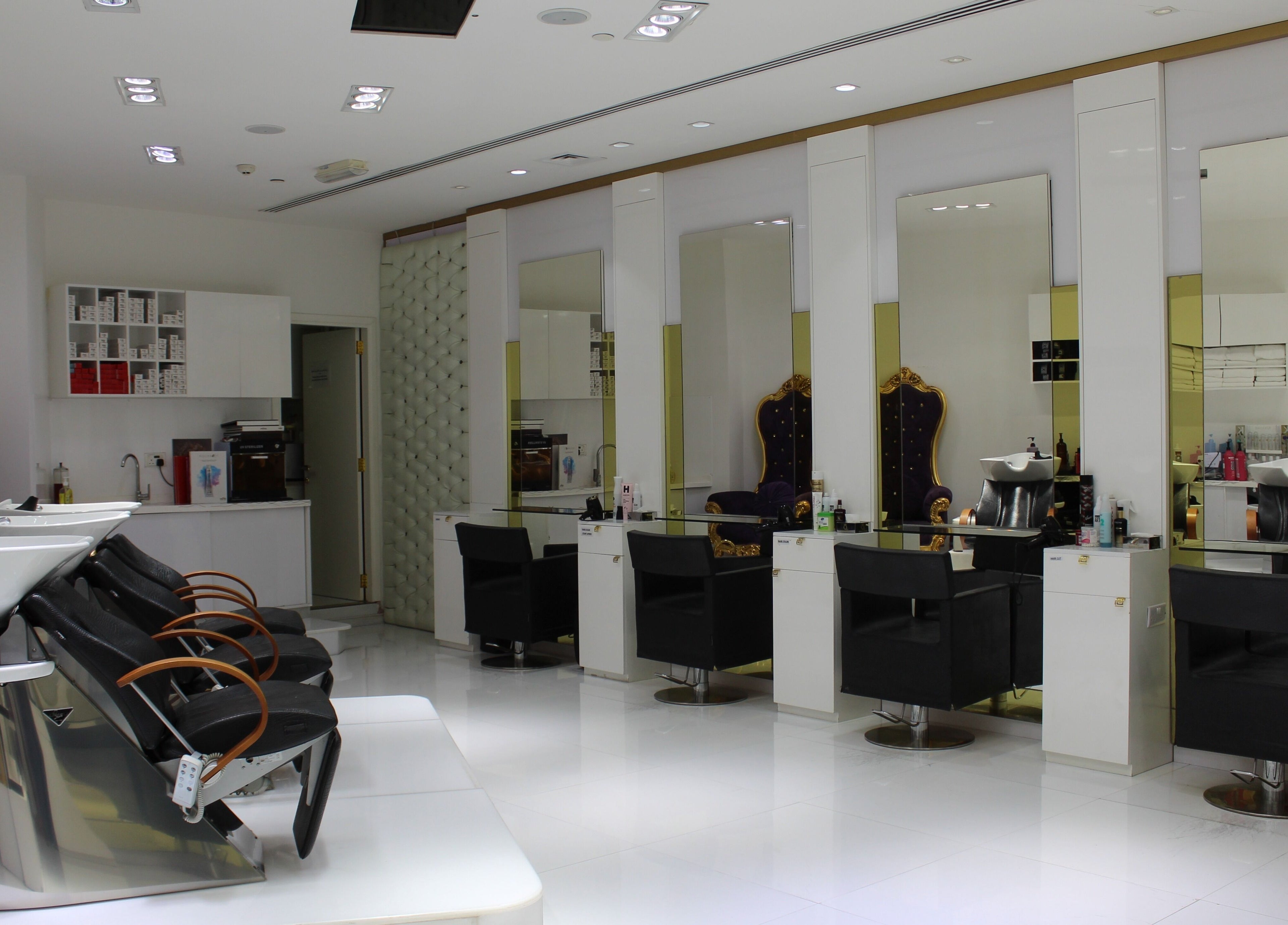 Elegant interior of Hush Salon Prive - Ladies Only & Moroccan Bath, Dubai, Dubai, AE, showcasing luxury styling chairs.