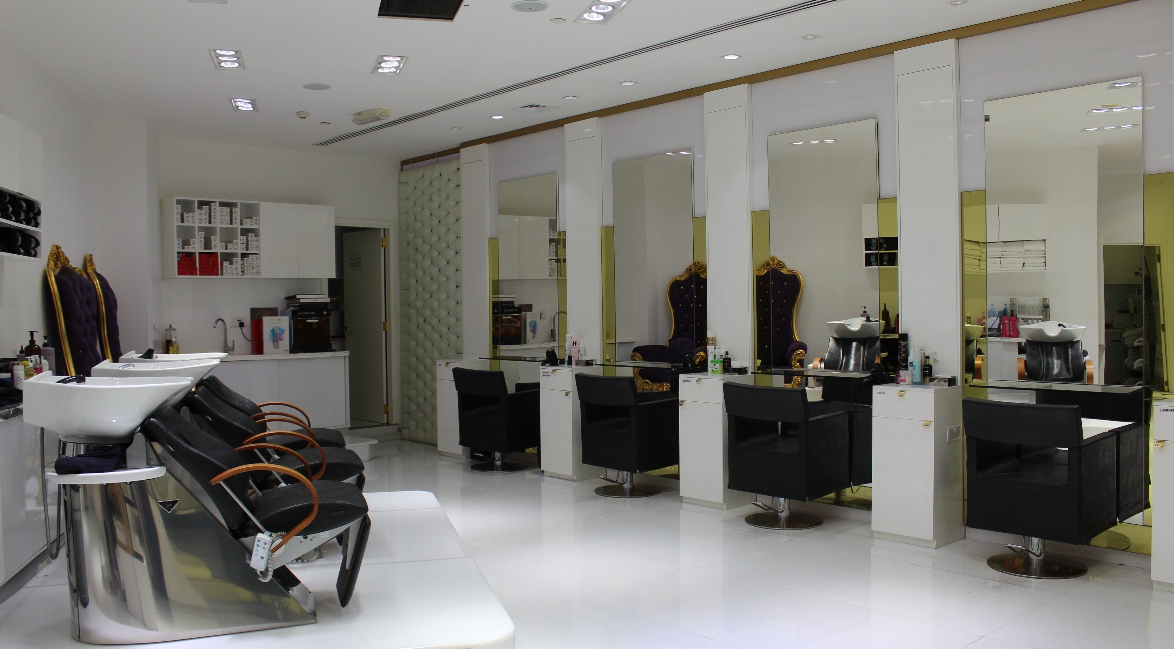 Elegant interior of Hush Salon Prive - Ladies Only & Moroccan Bath, Dubai, Dubai, AE, showcasing luxury styling chairs.