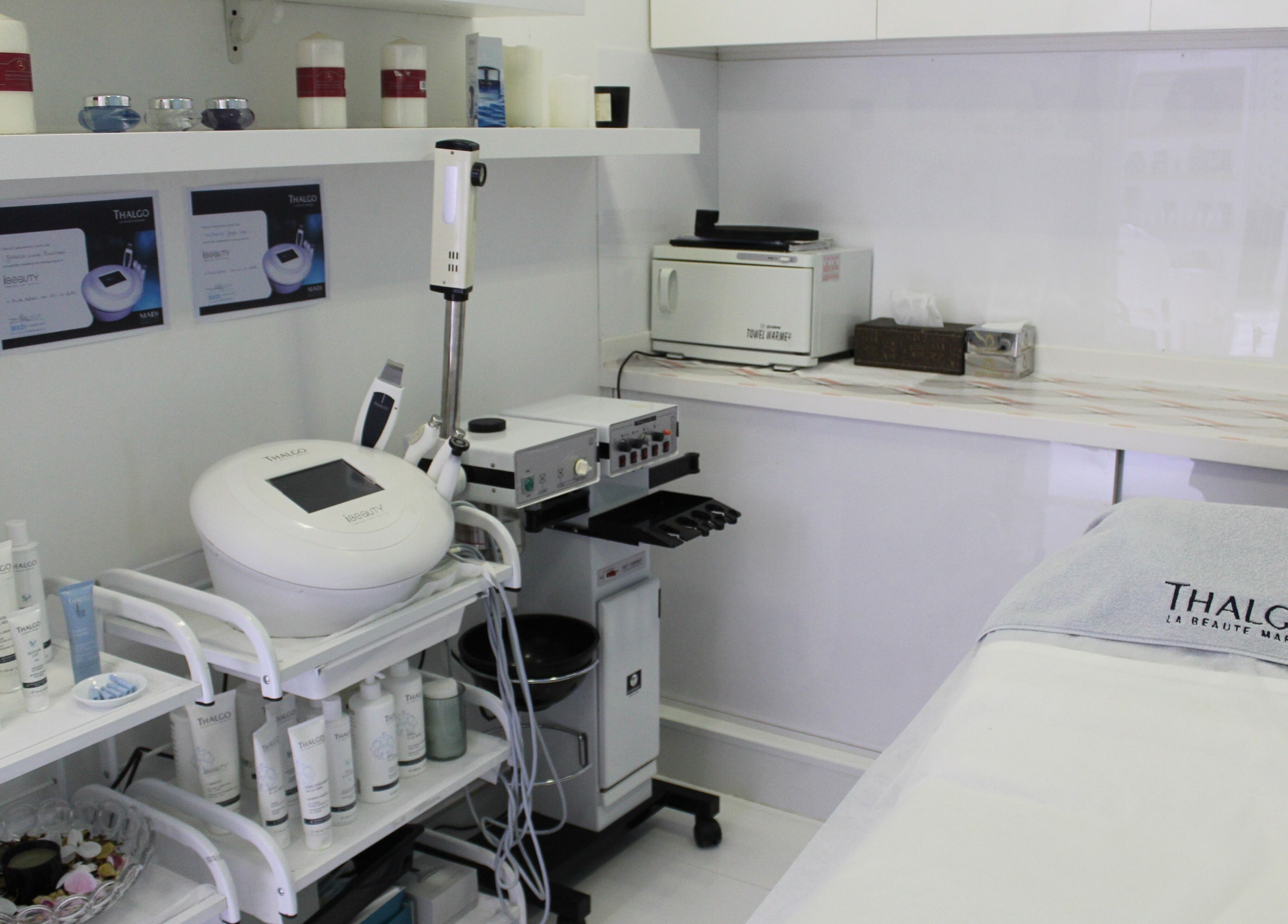 Modern treatment room at Hush Salon Prive - Ladies Only & Moroccan Bath in Dubai, Dubai, AE, featuring spa equipment.