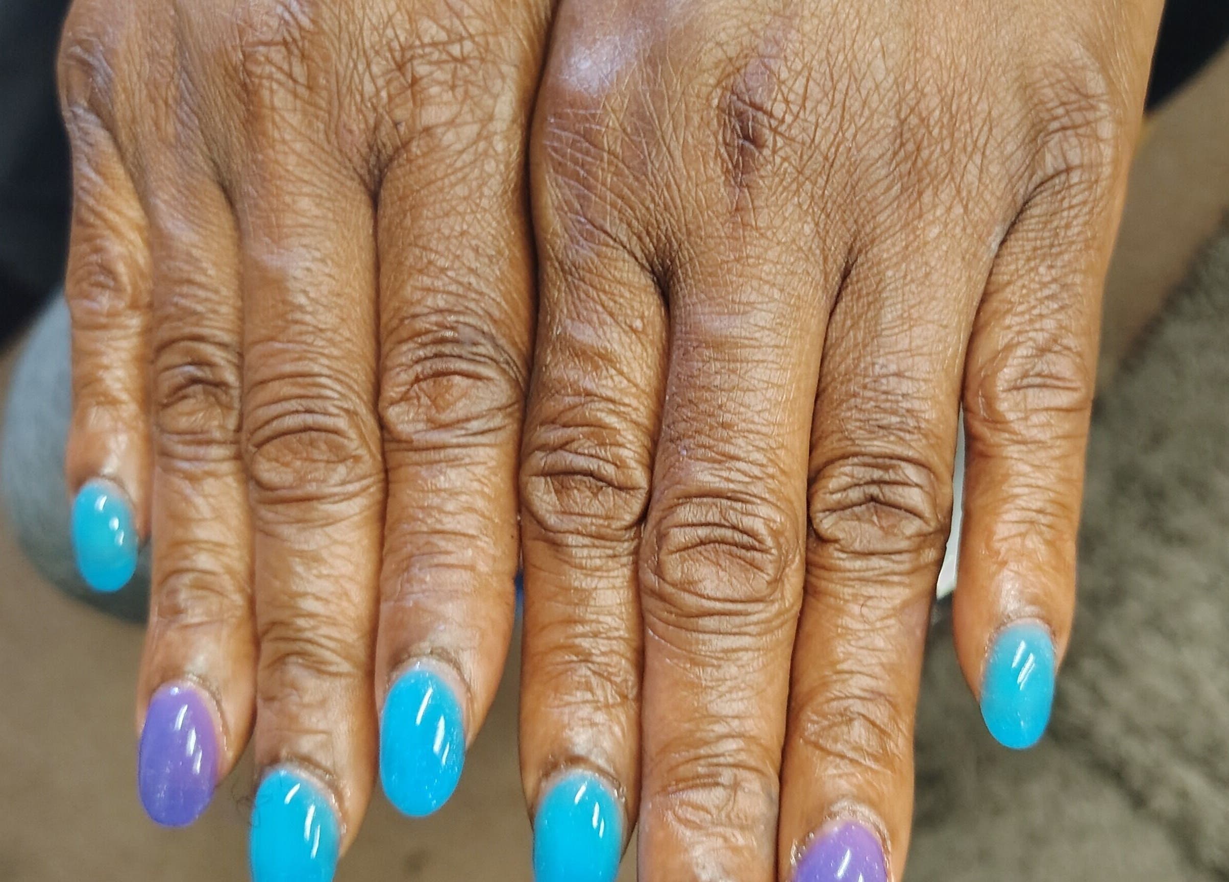 Vivid blue and purple manicure at QueenCo Nails, Bartlett, Tennessee, US.