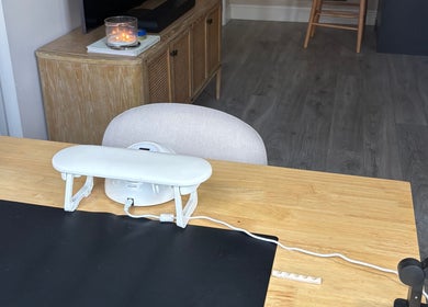 Cozy desk space at By Amelia Ldn, London, England. Features modern decor and a relaxing ambiance.