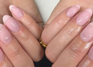 Elegant pink almond nails by By Amelia Ldn in London, England, GB showcasing glossy finish and expert care.