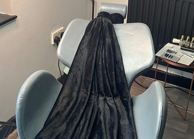 Relaxing treatment chair at TG Beauty, London, England, GB, perfect for wellness services.