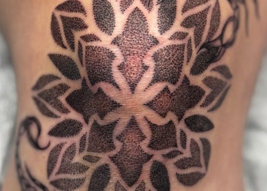Detailed dotwork tattoo design at Slyther INK in Spokane, Washington, US showcasing expert artistry.