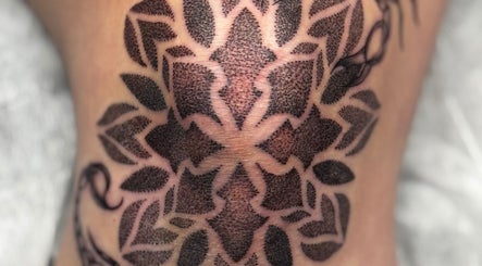 Detailed dotwork tattoo design at Slyther INK in Spokane, Washington, US showcasing expert artistry.