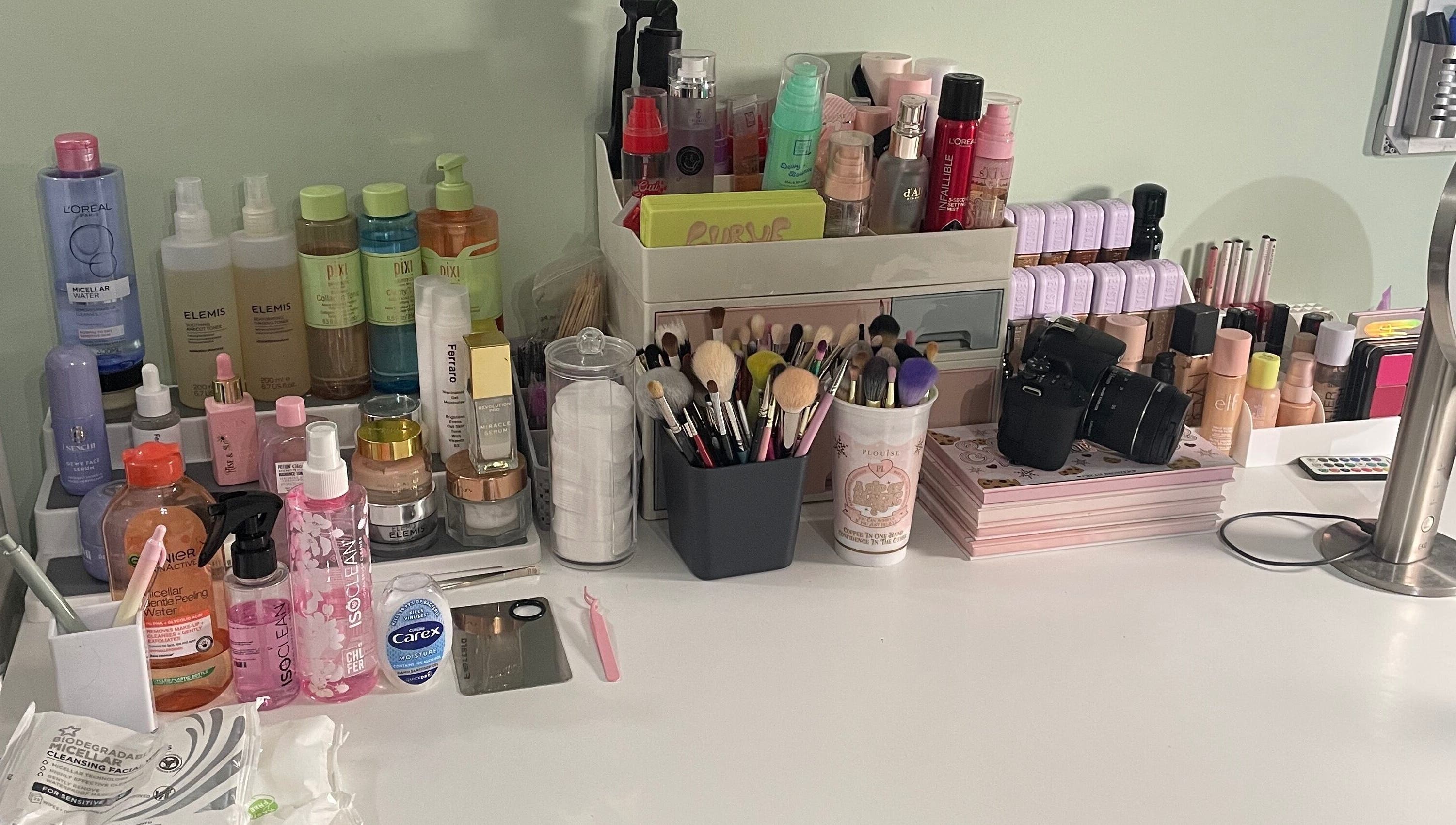 Makeup products and brushes at karlyb.mua.liverpool studio, Liverpool, England, GB, showcasing a professional setup.