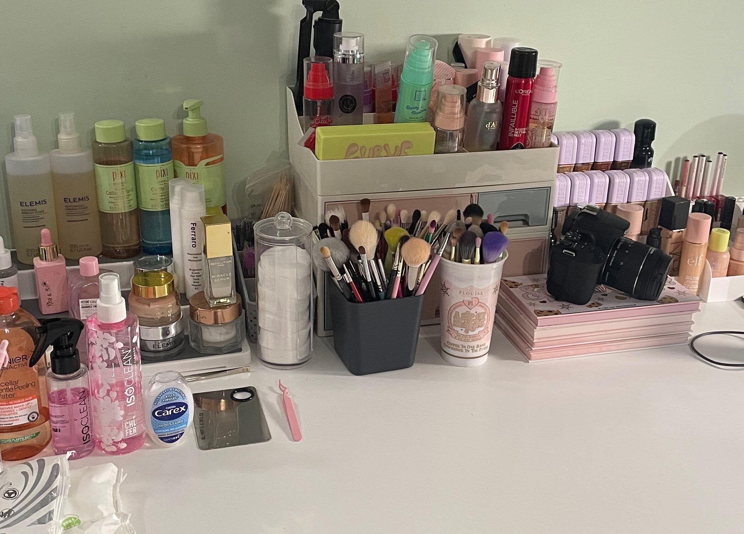 Makeup products and brushes at karlyb.mua.liverpool studio, Liverpool, England, GB, showcasing a professional setup.